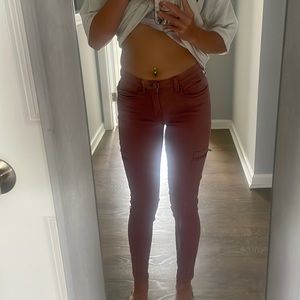 Cute pair of skinny jeans. The color is a light pink, really cute.